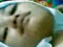 मलय पहनने tudung jer